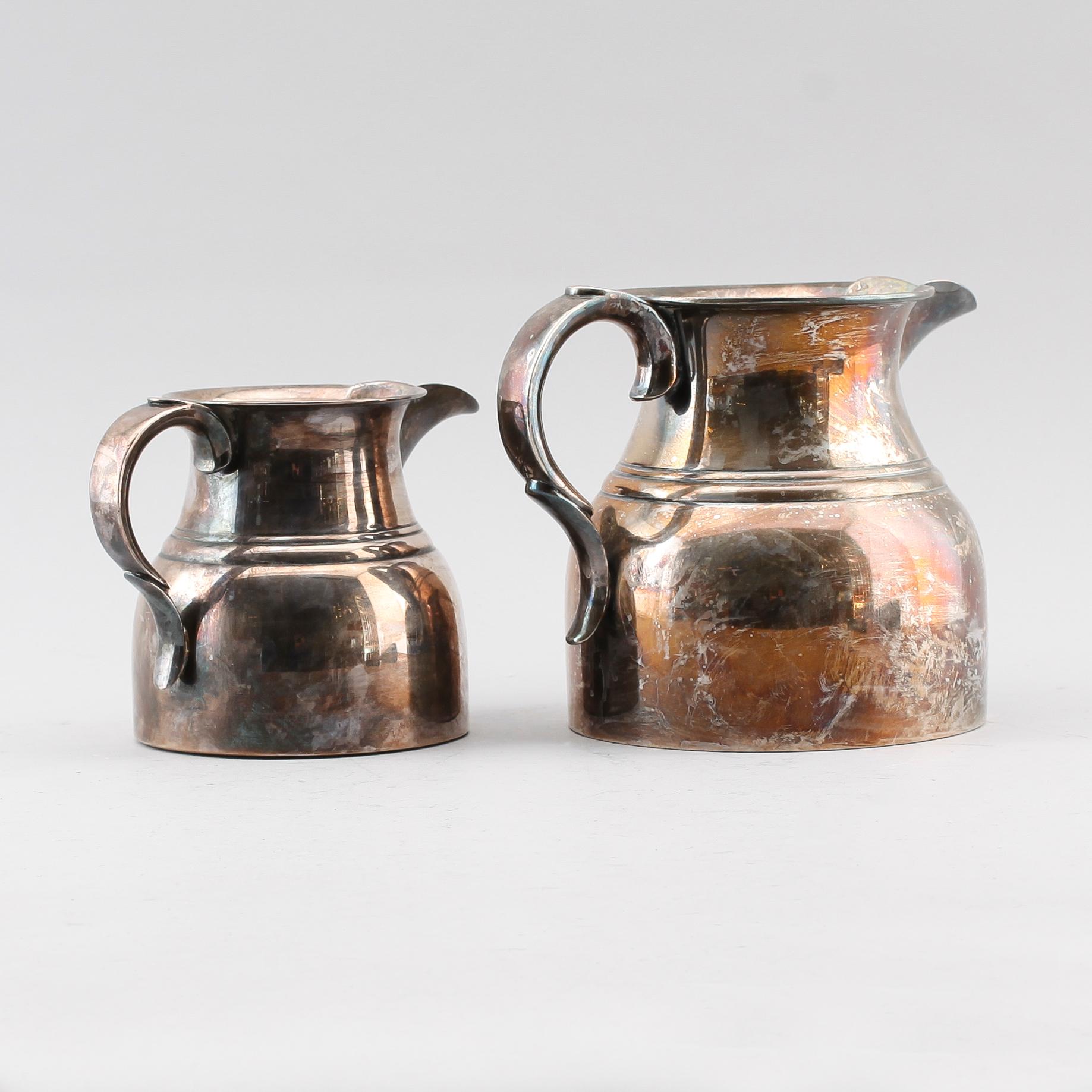 KANNOR, 2 st, nysilver, 1900-talets första hälft.