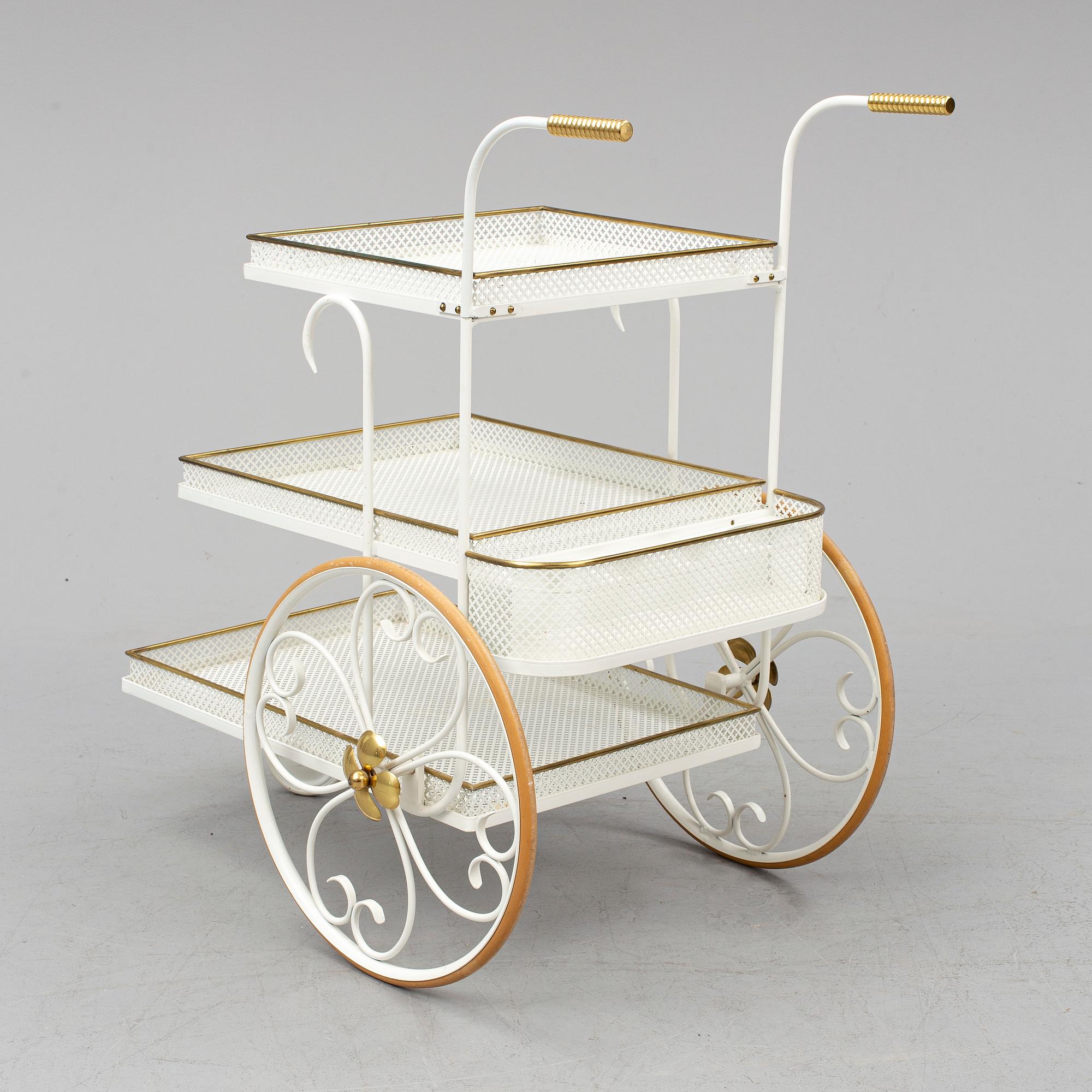 a serving trolley purchased at Firma Svenskt Tenn in the middle of the 20th century.