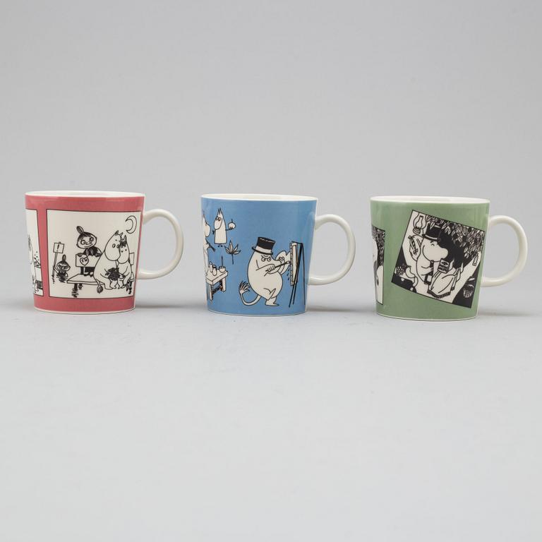 Three porcelain mugs by Arabia, Finland, with Moomin characters, 1990.