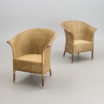 A PAIR OF ARM CHAIRS, Lloyd Loom, Spalding England, for Mulberry's Home, turn of the 21st century.