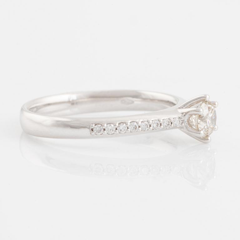 Brilliant cut diamond solitaire ring, with IGI report.