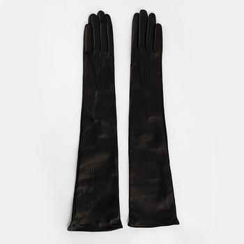 Prada, a pair of black leather gloves, size 6 1/2.