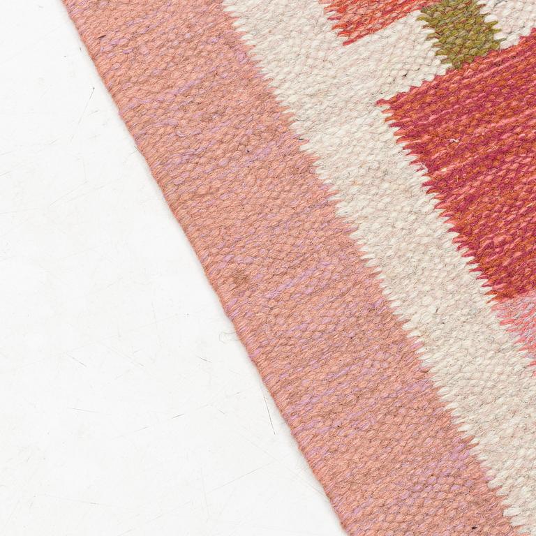 A flatweave carpet, signed JK, 210 x 140 cm.