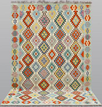 A kilim carpet, ca 294 x 208 cm.