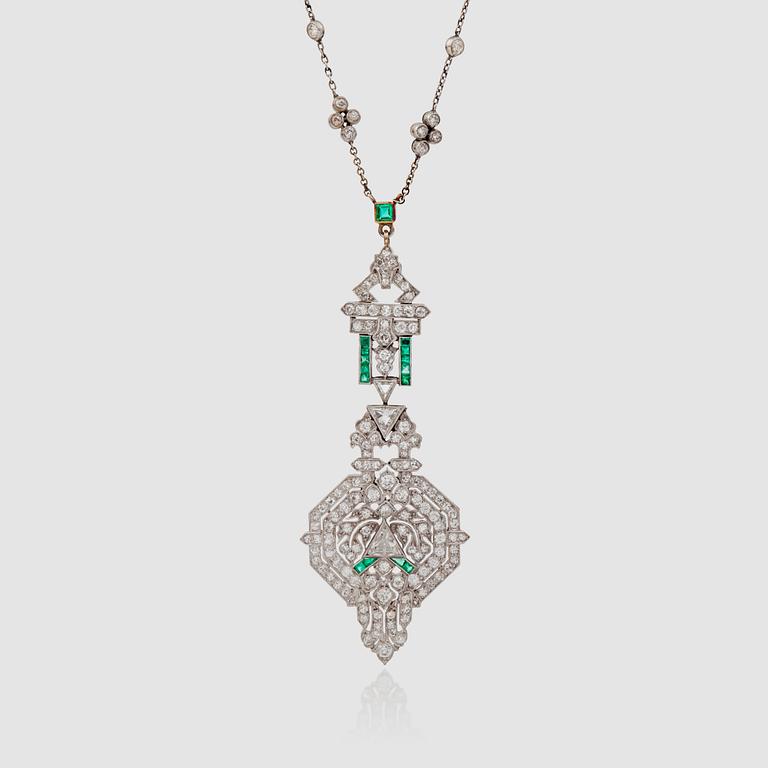 An Art Deco emerald and old-cut diamond necklace. Total carat weight of diamonds circa 3.00 cts.