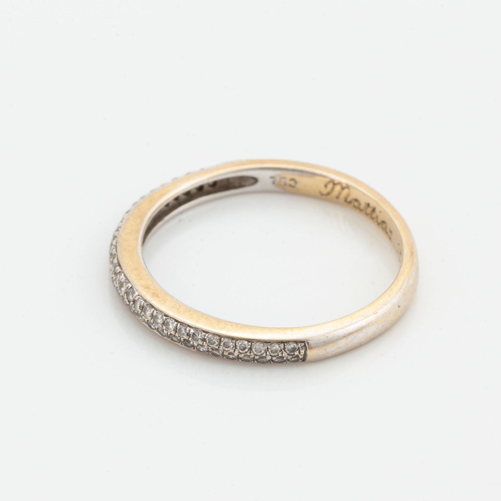 18K gold and small brilliant-cut diamond ring.