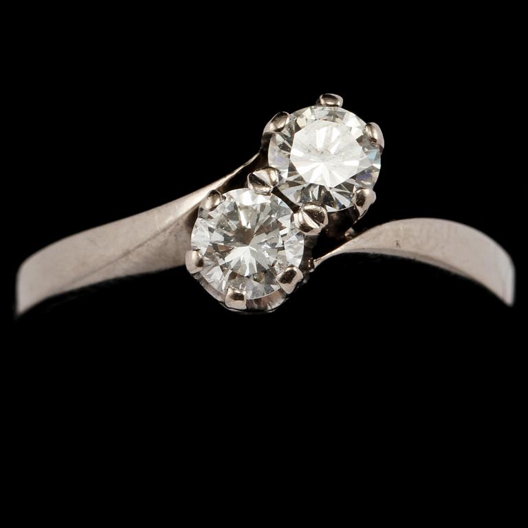 RING, 18k vitguld med 2 briljantslipade diamanter, tot 0.45 ct, Bo Cedstam, Stockholm, 1972. Vikt 3 g.