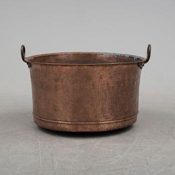 A 19th century copper cauldron.