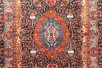 A Kashmir carpet, a. 390 x 305 cm.