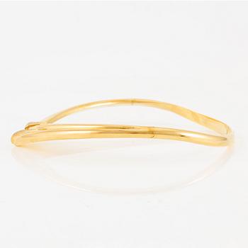 A necklace in 18K gold with round brilliant-cut diamonds.