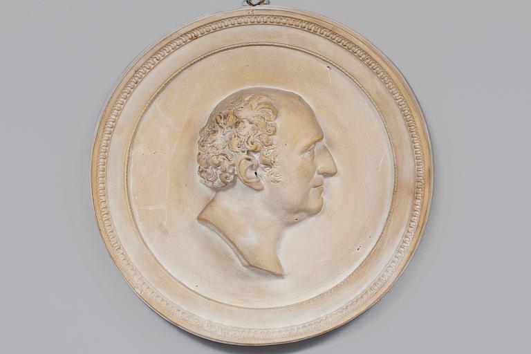 A WALL MEDALLION.