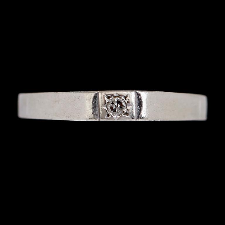 SMYCKEN, 3 delar, 18 k vitguld, briljantslipade diamanter. Total vikt ca 2,9 g.