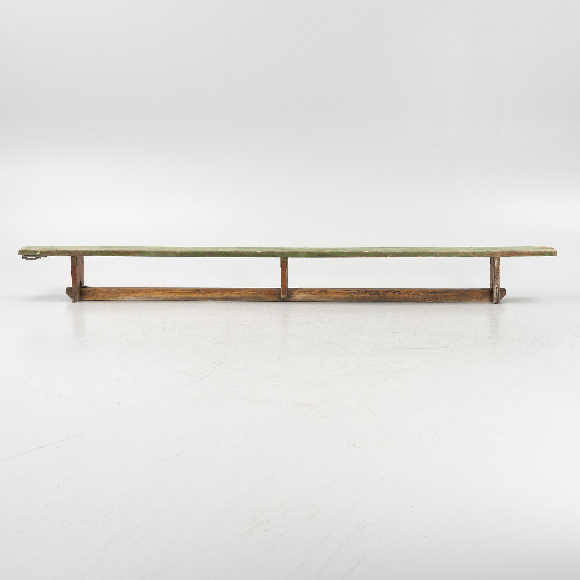 A painted bench, 20th Century.