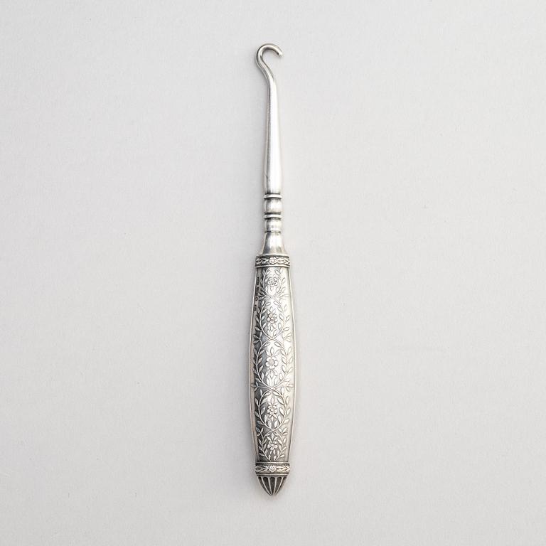 A silver button hook for gloves, W.A. Bolin, Stockholm 1917.