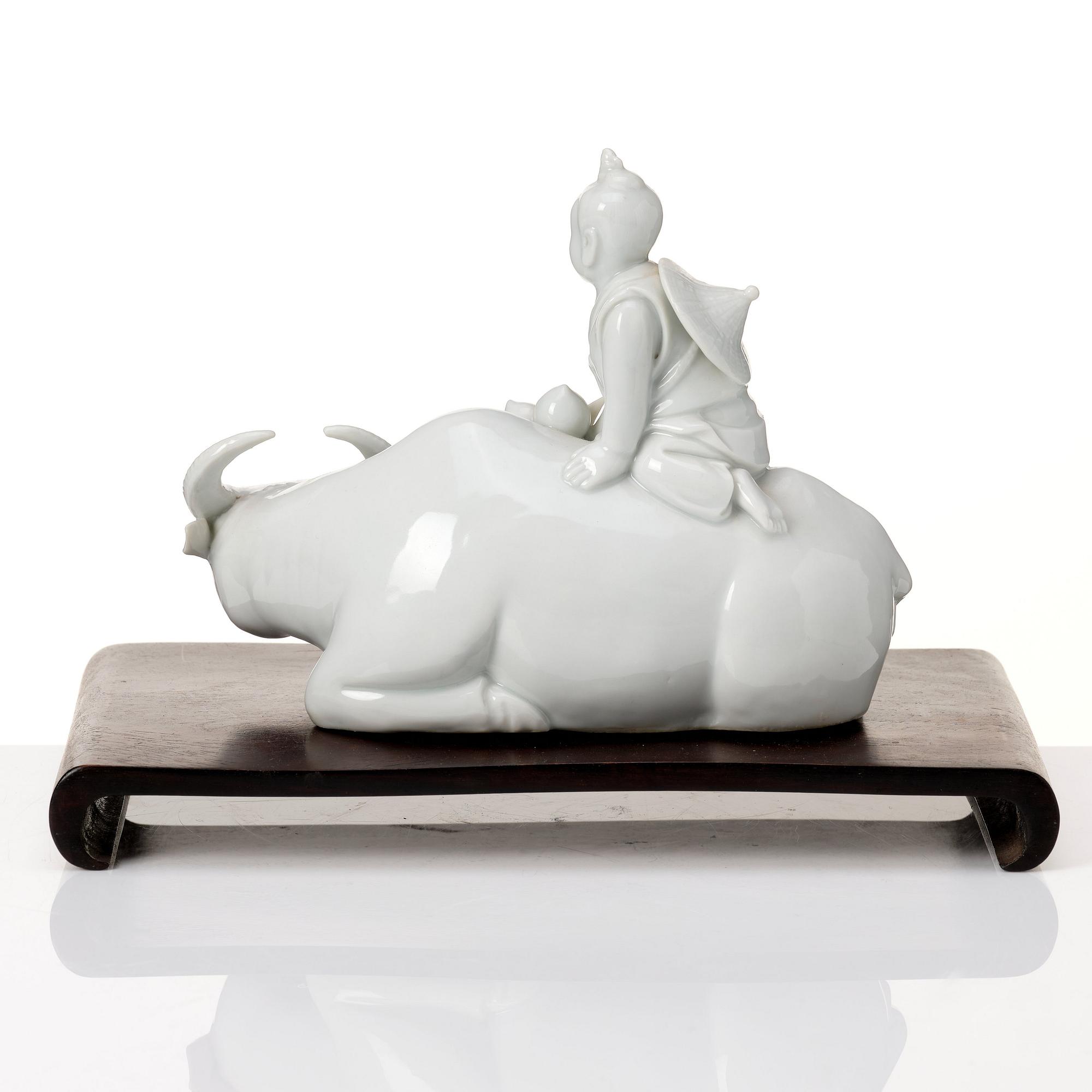 A pair of blanc de chine figurines, Qing dynasty, late Qing dynasty.