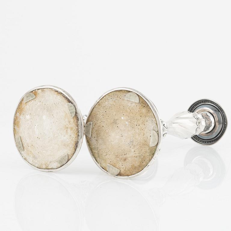 A pair of silver candle sticks by K Anderson Stockholm 1898.