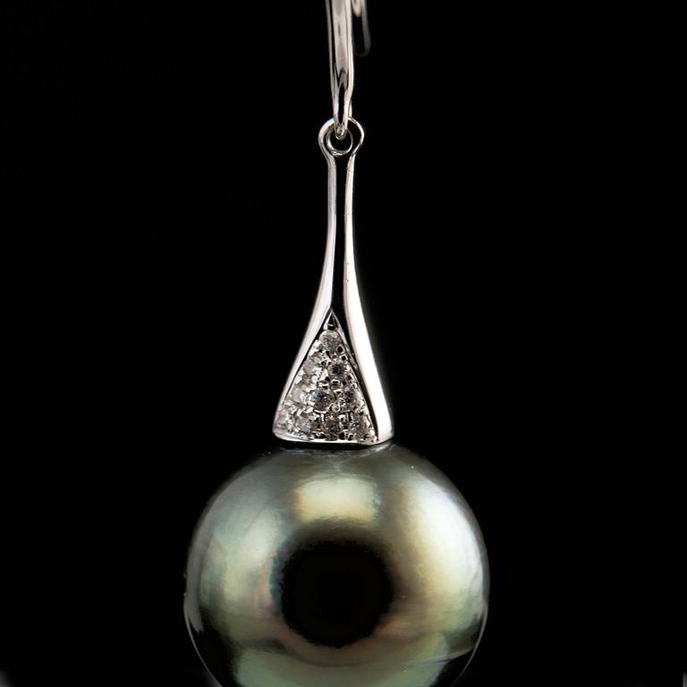 A PAIR OF EARRINGS, tahitian pearls 13 mm, brilliant cut diamonds c. 0.17 ct. 18K white gold. Length 3,5 cm.