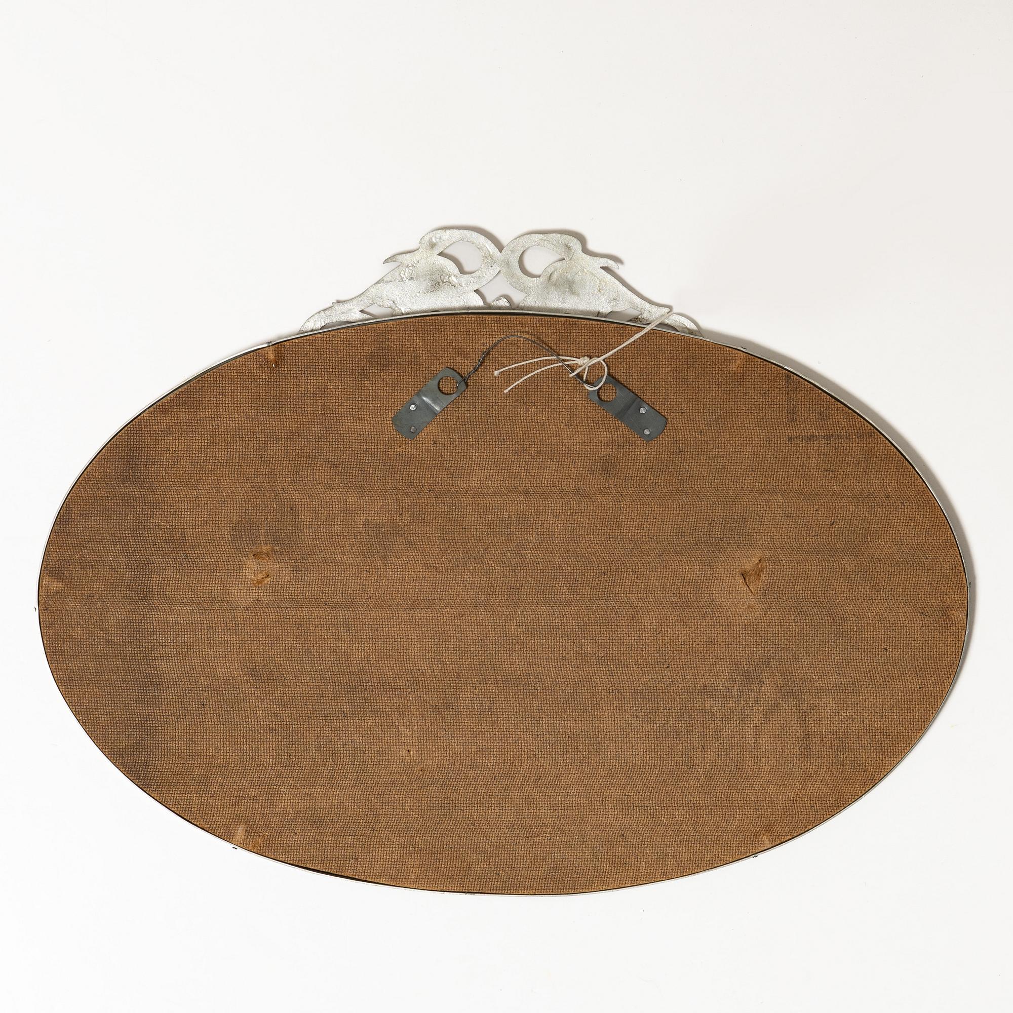 Mirror and mirror sconces, a pair, tin, Sweden, 1920s-30s.