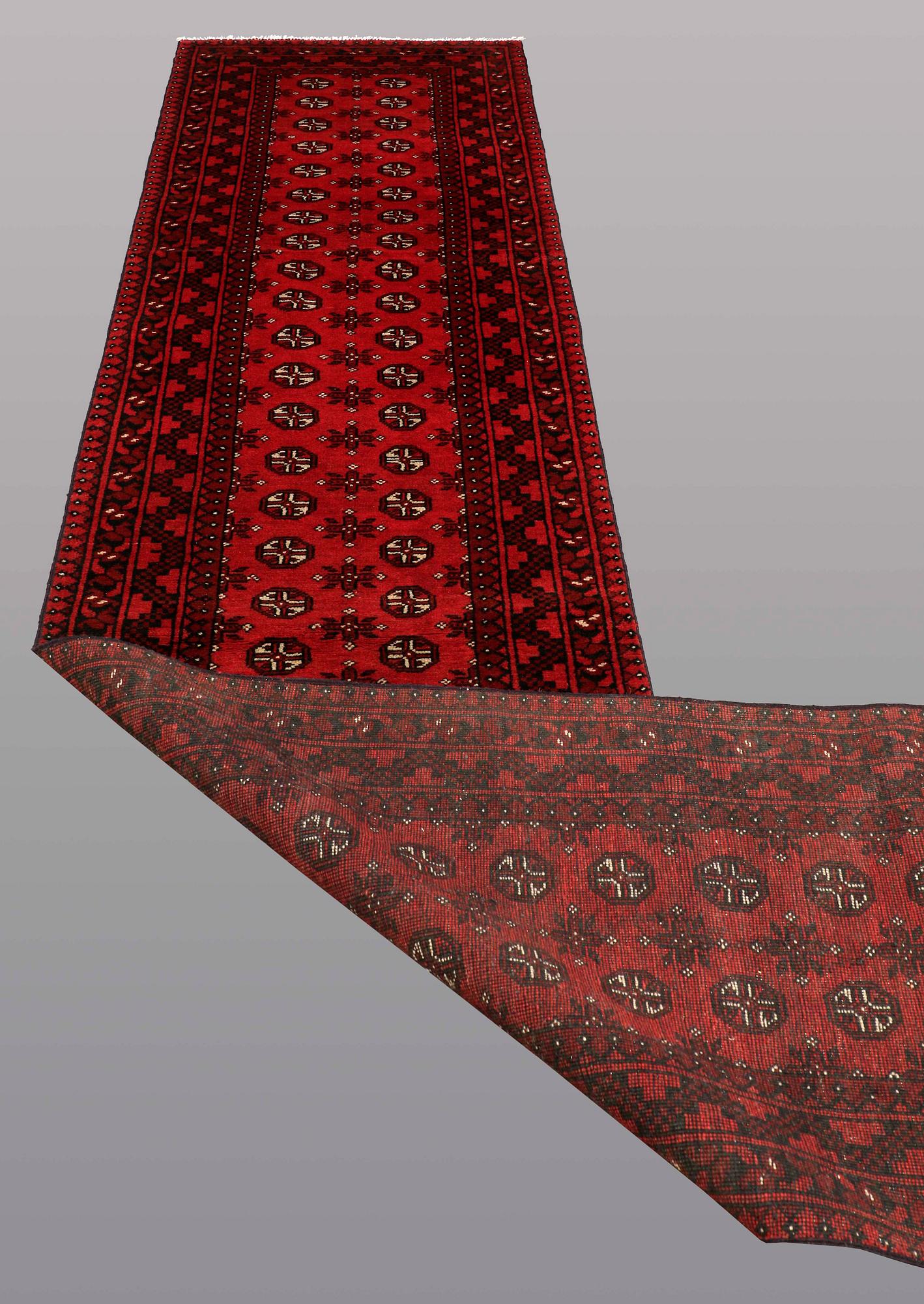 A RUNNER, Afghan, ca 498 x 83 cm.