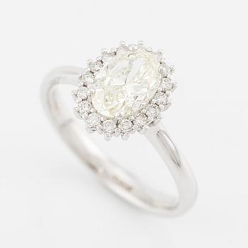 Ring with an oval brilliant-cut diamond of 1.20 ct accompanied by the following GIA report.