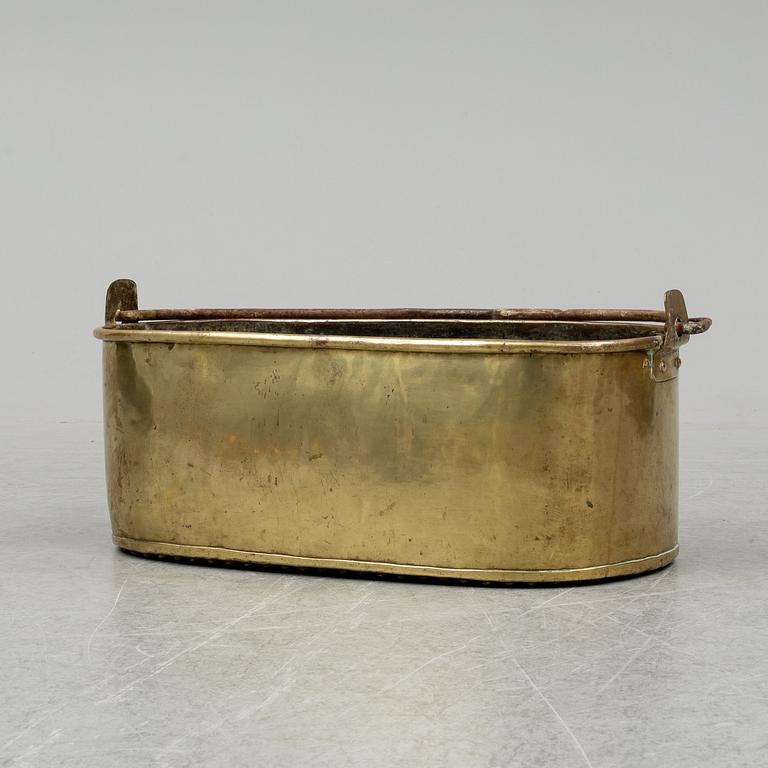 A 19th century brass fish pan.