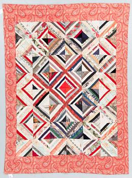 A QUILTED PATCHWORK BED COVER, Sweden first half of the 20th century, ca 191 x 139 cm.