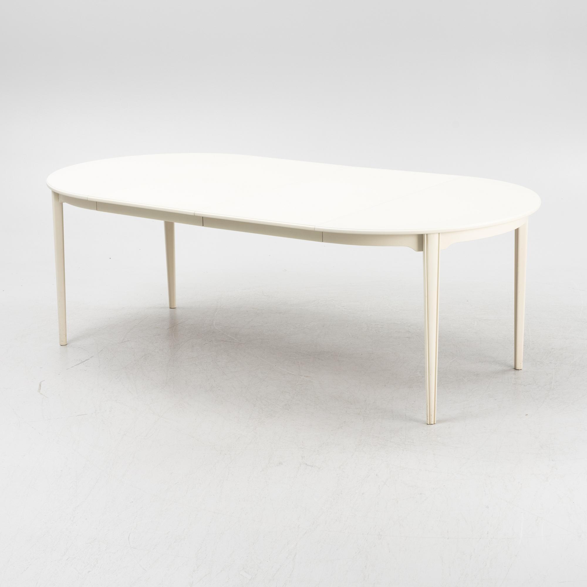 A Gustavian style table with four chairs, second half of the 20th century.