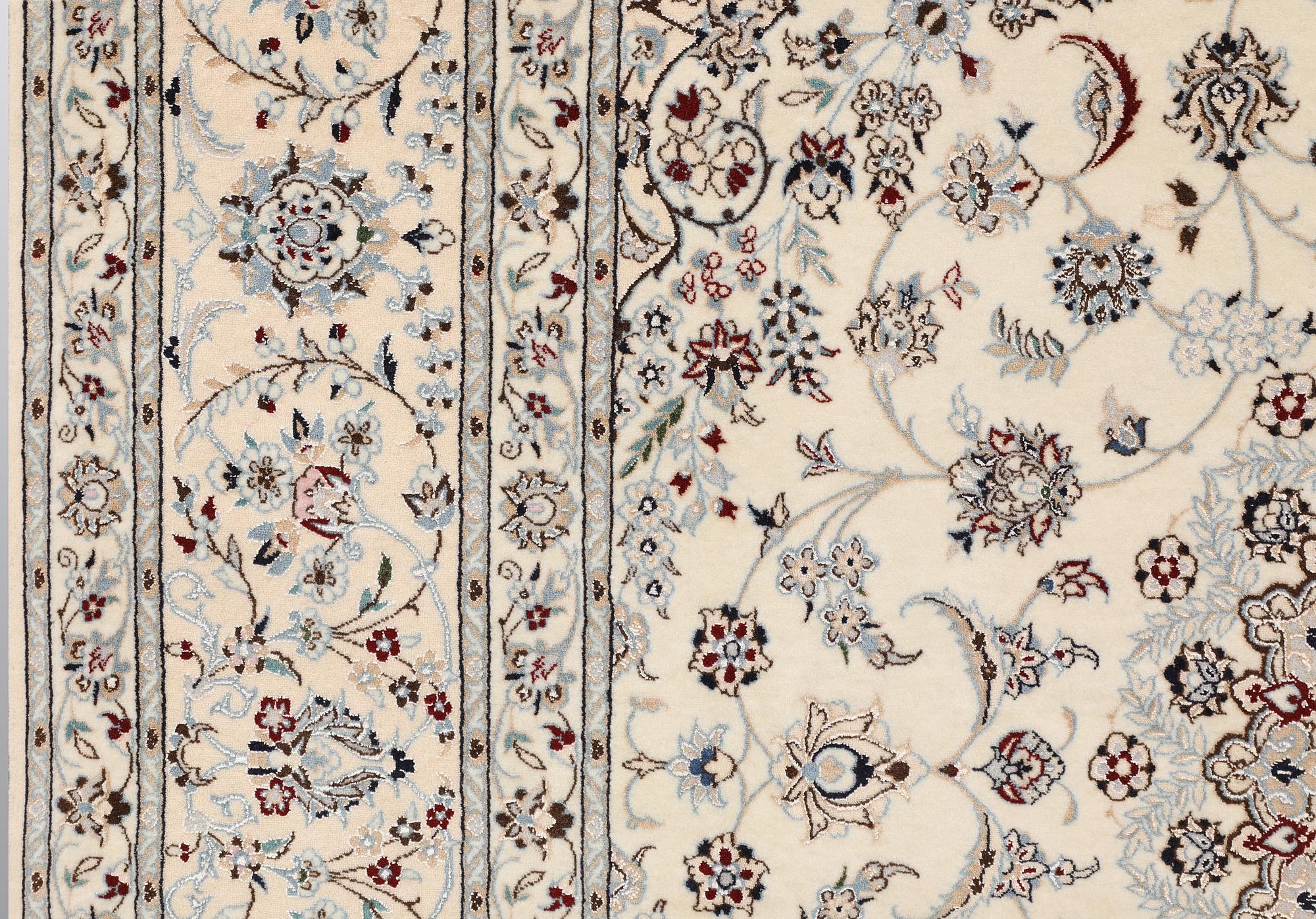 A Nain part silk carpet, c. 207 x 208 cm.