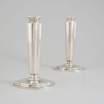 A pair of sterling silver candle sticks by Atelier Borgila. Stockholm 1956.