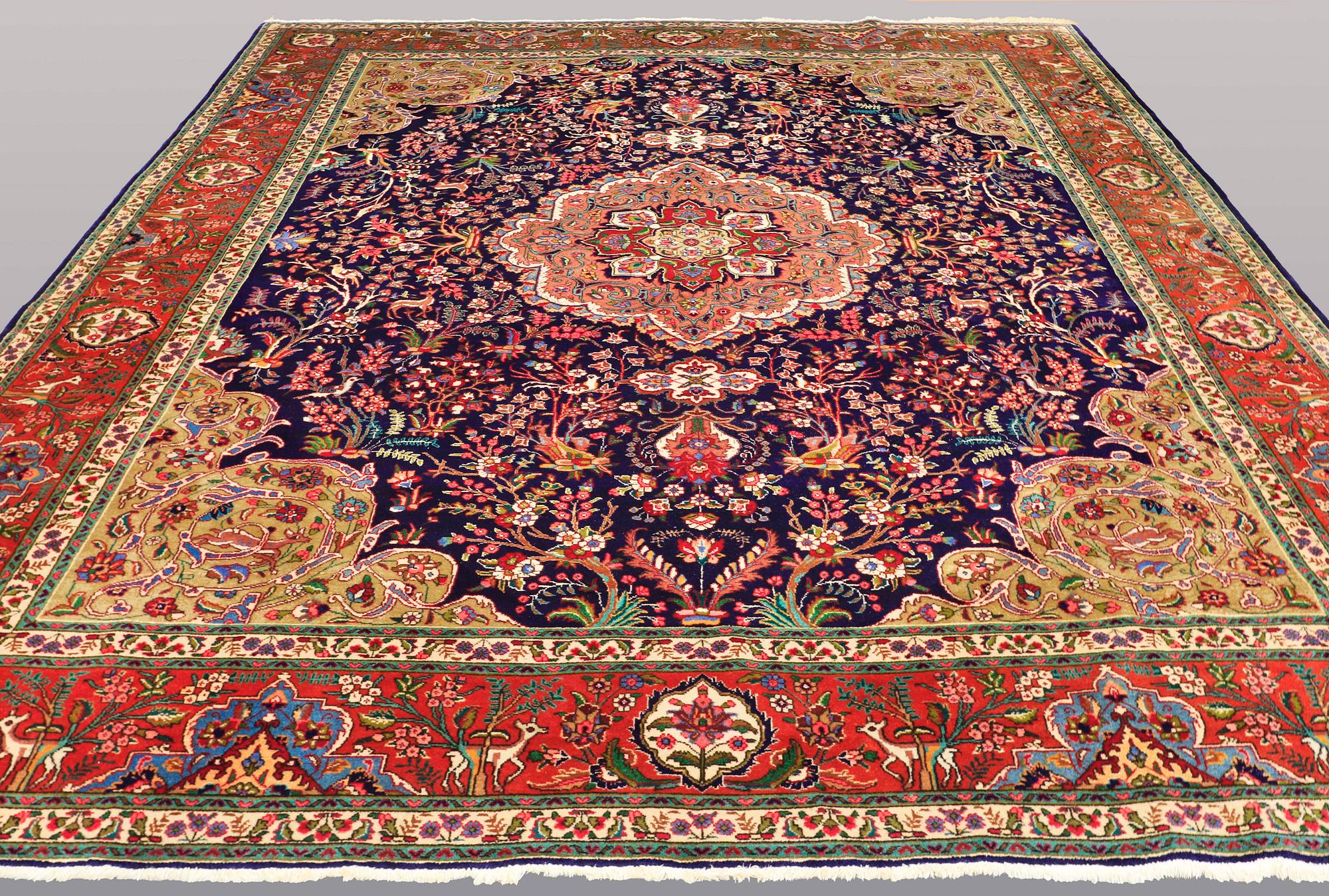 A CARPET, Figural Tabriz, ca 407 x 304 cm.