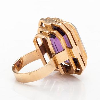 A 14K gold ring with amethyst.