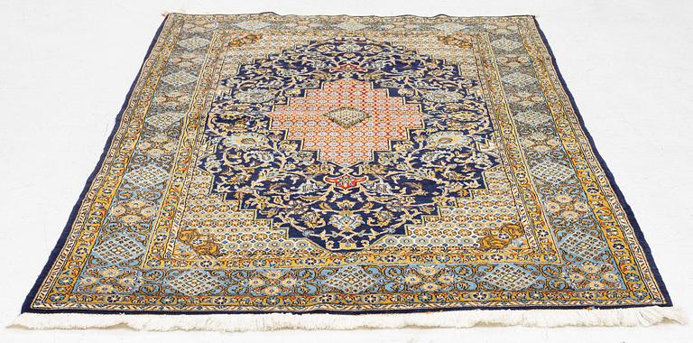 A Ghom/Shahreza rug, c. 202 x 140 cm.