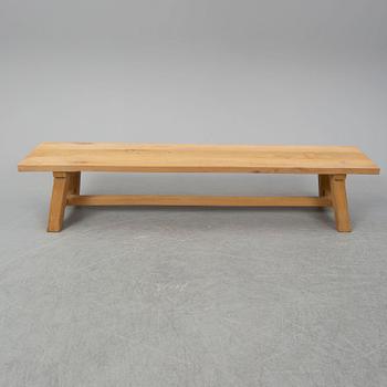 A contemporary oak table and two benches from Garbo Interiors.