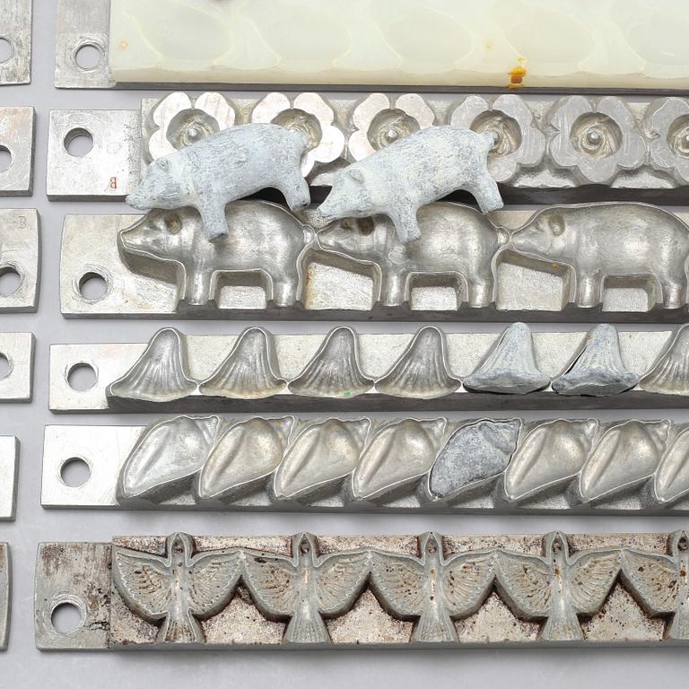 14 mid 20th century marzipan molds.