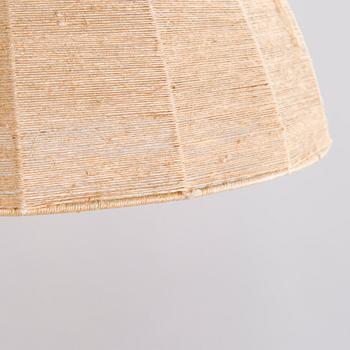 A mid-20th century wall light for Valinte, Finland.