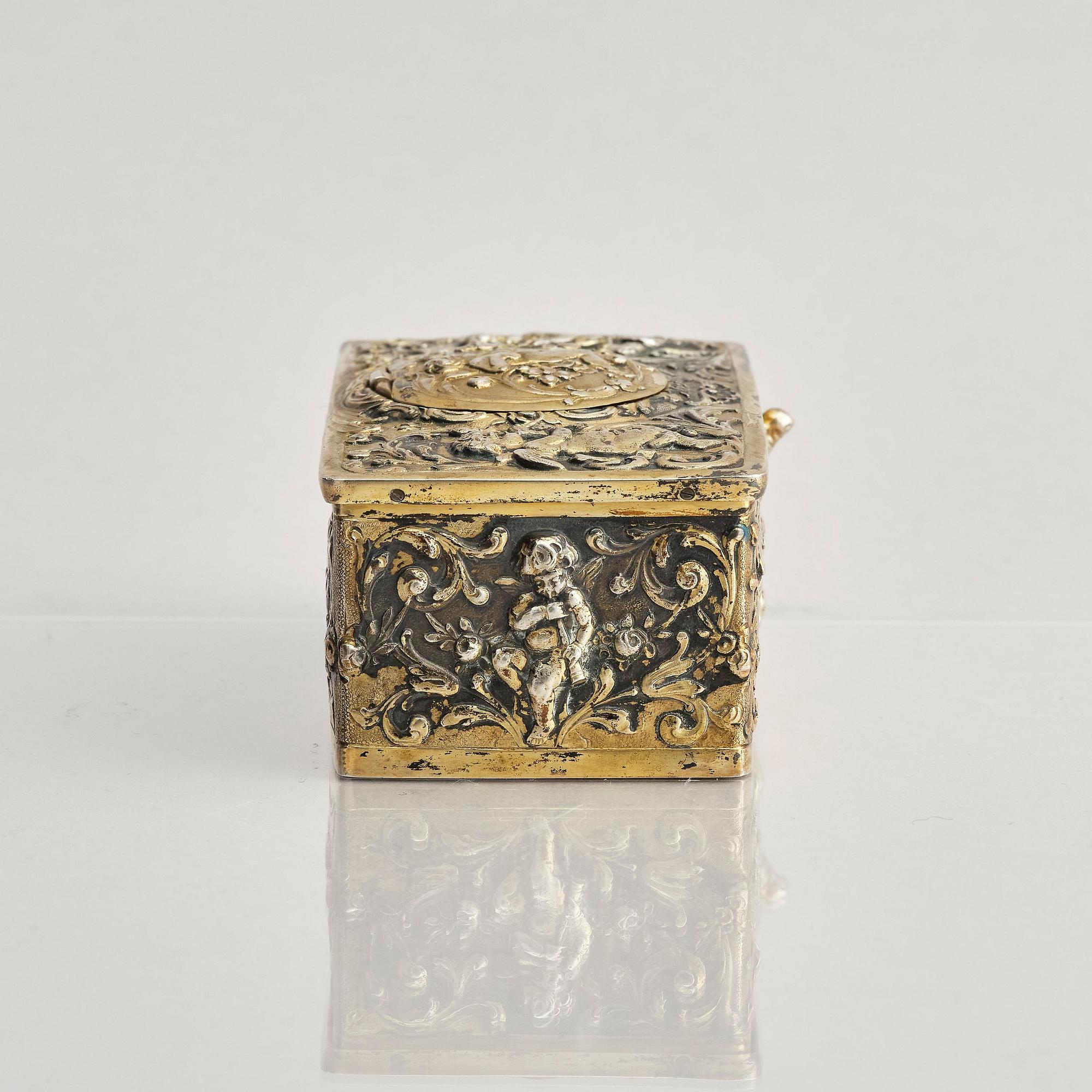 Music box. gilded 800 silver. Germany, late 19th/early 20th century.