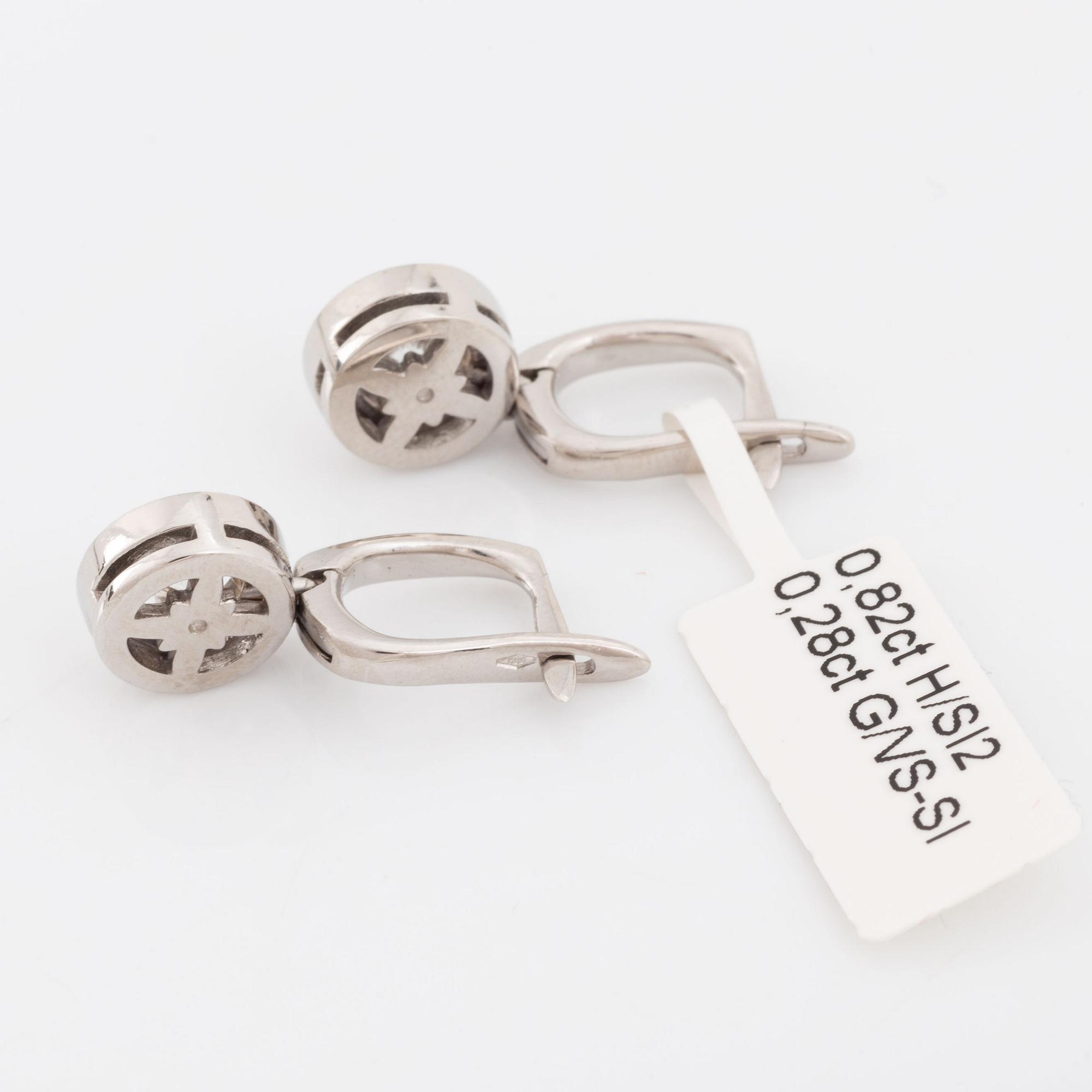 Brilliant-cut diamond earrings.