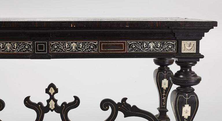 A Renaissance-style ebony, ebonized and ivory-inlaid library table, late 19th century, presumably Germany.
