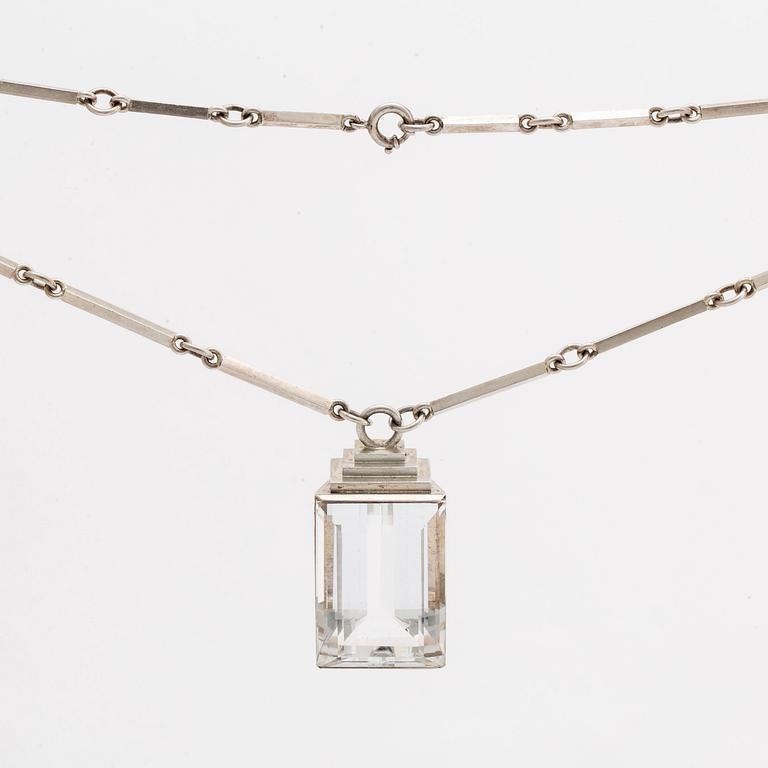 A Wiwen Nilsson sterling and rock crystal pendant and chain, stamped 'New York 39', Lund 1939.