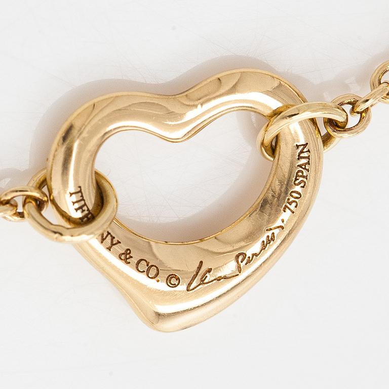 Tiffany & Co, Elsa Peretti, an 18K gold 'Open Heart' bracelet.