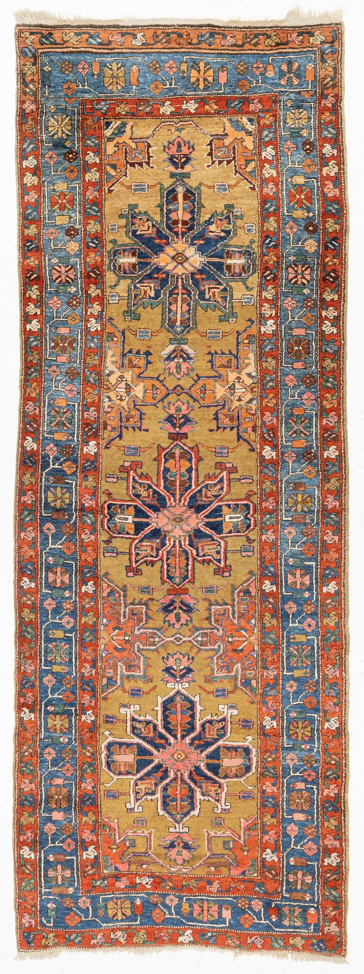A Heriz Gorovan runner, semi antique, c. 307 x 110 cm.