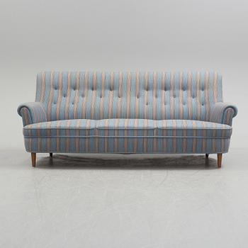 A Carl Malmsten"Hemmakväll" sofa from late 20th century.