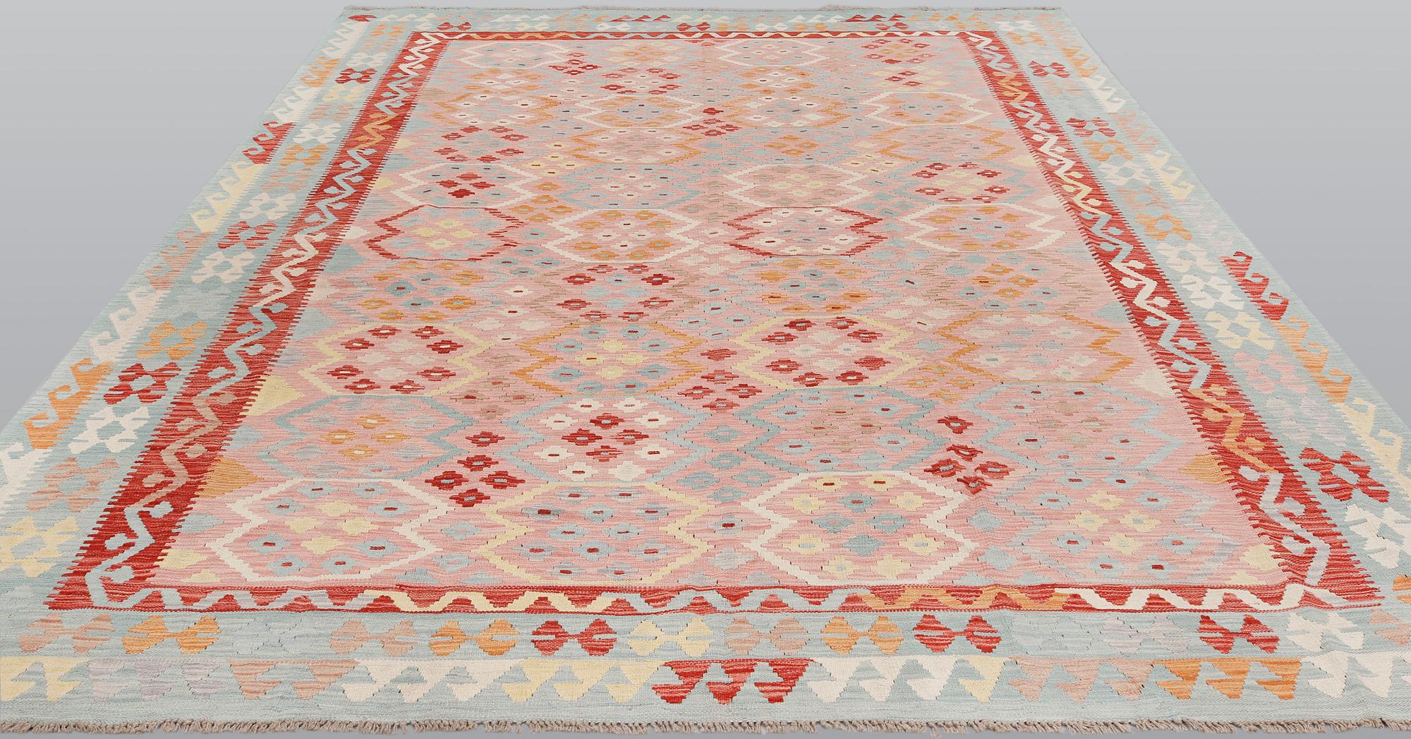 A Kilim carpet, approx. 342 x 255 cm.