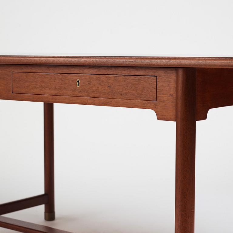 Mogens Koch, an important free standing mahogany desk by N.C. Jensen Kjær, Denmark 1930's.