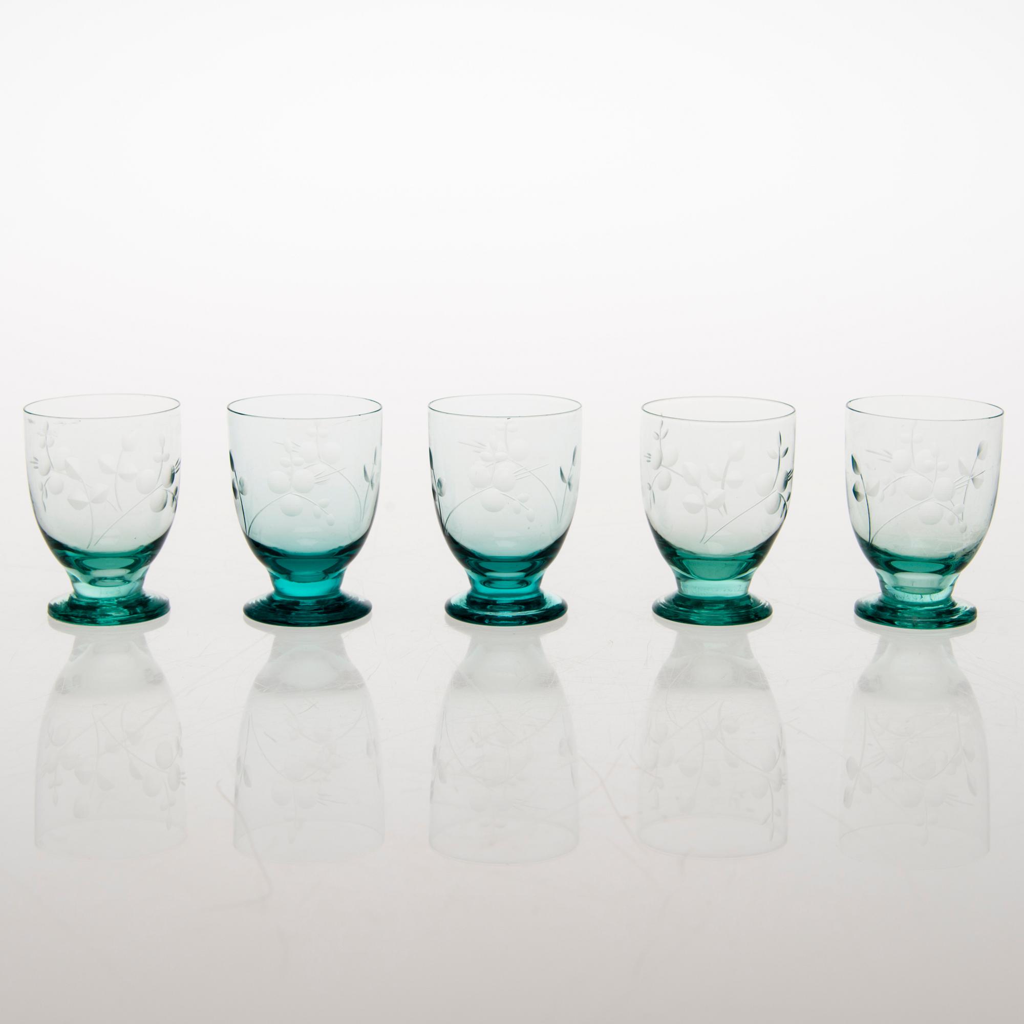 A set of five drinking glasses and a carafe from 1930s.