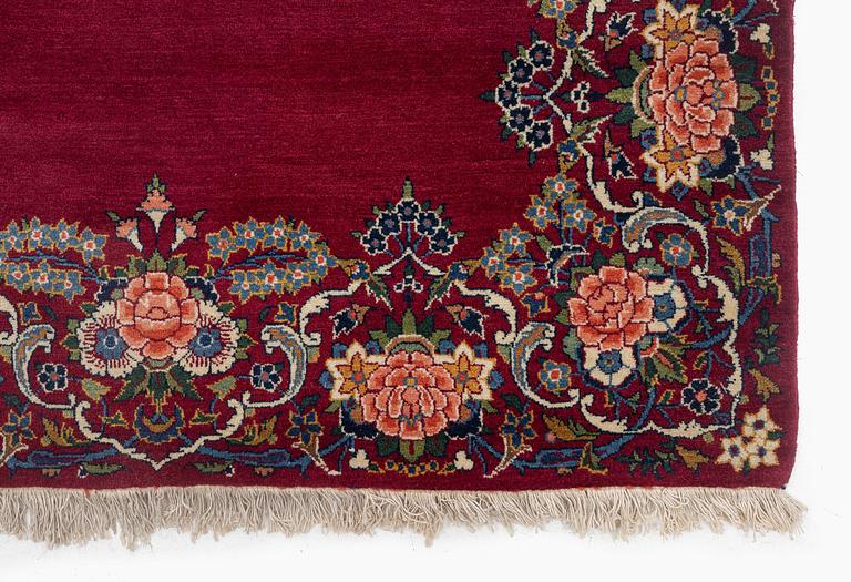 A semi-antique Keshan runner, c. 446 x 112 cm.