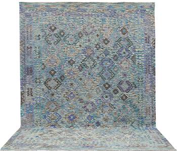 A kilim carpet, c 341 x 257 cm.