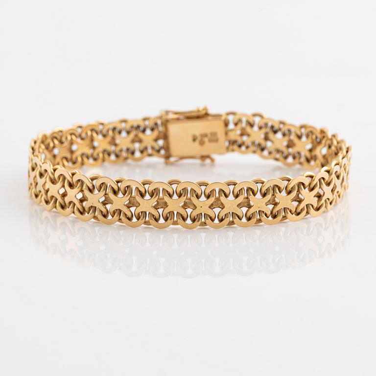 18K gold bracelet.