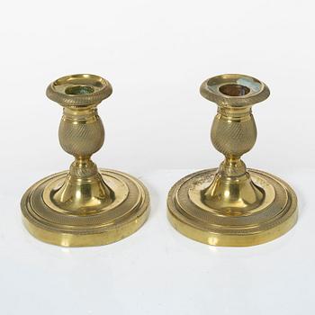 A pair of candle sticks, Empire, France, first half of the 19th century.