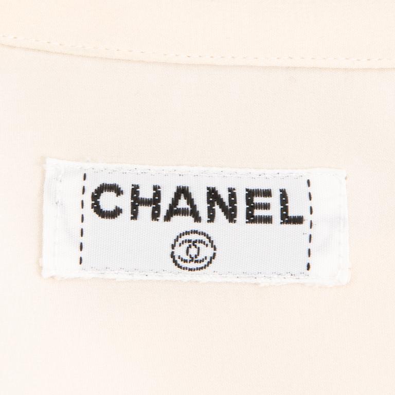 Two Chanel Crepe de Chine Cream Coloured Silk Blouses.